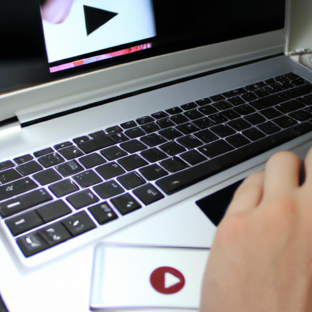 Person streaming video on laptop