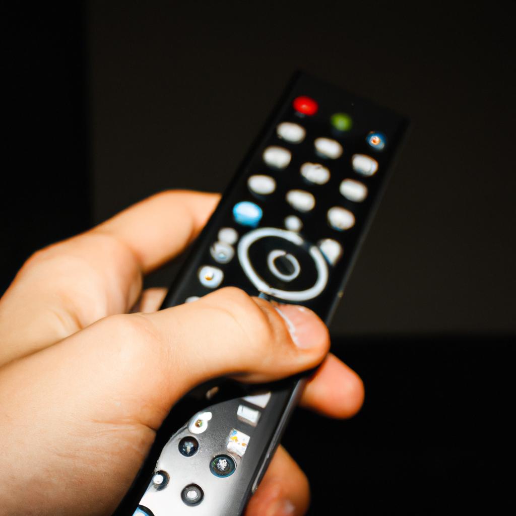 Person holding remote, choosing service