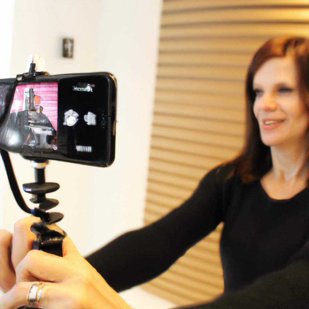 Woman filming video on smartphone